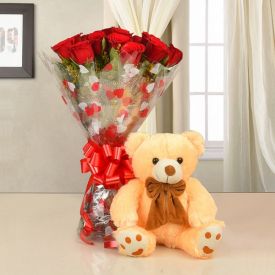 A vase of 30 mixed roses, and pink (12-inch) teddy bear