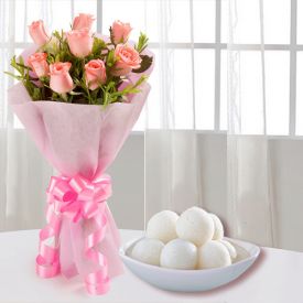 A bunch of lovely 12 pink roses with 1 kg Rasgulla from Haldiram.