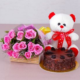 A bunch of 20 pink, or yellow roses, 1 kg fruit cake and 6 inch teddy.