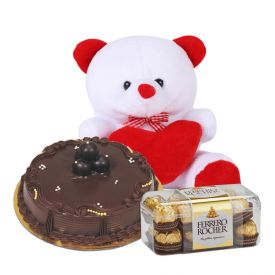 1kg chocolate cake, 6 inch teddy bear and12 ferrero rochers.