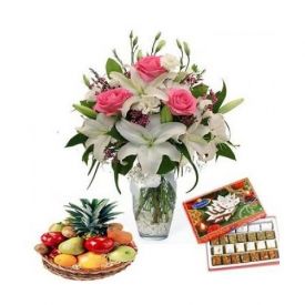 Bunch of 3 Pink roses, 3 White roses and 3 White Lily flowers, 2 Kg Mixed fruit basket and 1 Kg Mix