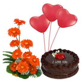 1/2 kg chocolate cake, 3 heart shaped balloons and 10 gerberas.