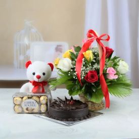 Red roses, chocolate cake, ferrero Rocher with teddy