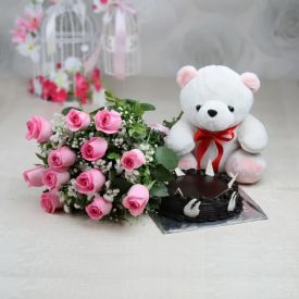 A vase of 10 pink roses, 1/2 kg chocolate Truffle cake and 6 inch teddy bear