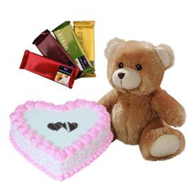 1 Kg heart shaped strawberry cake, 4 Tempatation chocolate and 12 inch teddy bear