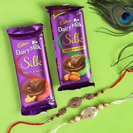 1 Cadbury?s Silk of 60gm ,1 Bournville Chocolate of 40gm ,rakhi
