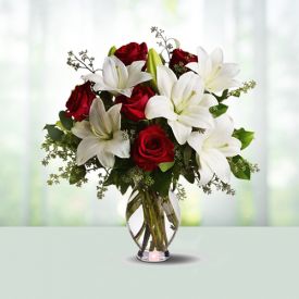 lilies and roses with vase