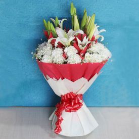 Bunch of white lilies and Red Carnation