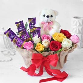 Bunch of 10 mixed Carnation, chocolates and Teddy