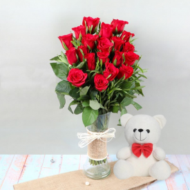 A vase of 20 red rose and a(6 inches) white teddy