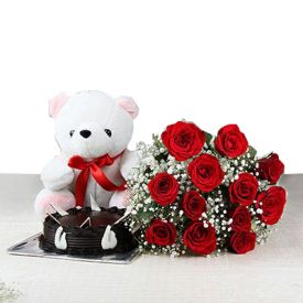 A Bunch of 12 Red Roses with Half Kg Chocolate Cake and Teddy Bear