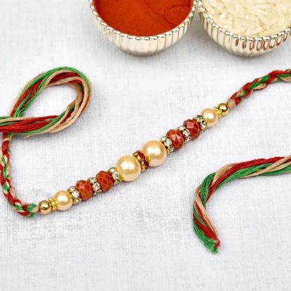 Red, White & Green pearls rakhi